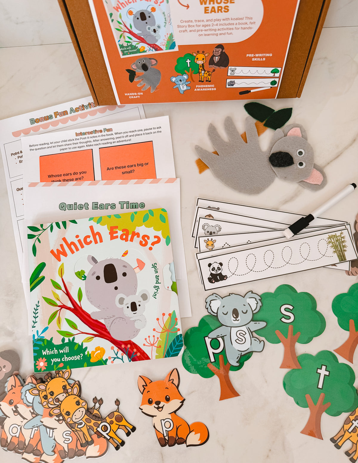 Educational materials for children with a focus on animals and letters, including books and flashcards.
